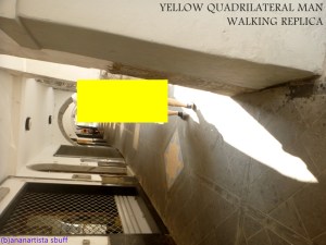 "WALKING YELLOW QUADRILATERAL MAN REPLICA" - (b)ananartista orgasmo Sbuff - digital art - www.bananartista.com